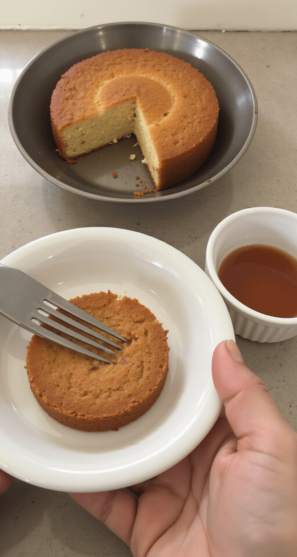 Cake Bento - Adorable Mini Cake Perfection A mini cake being prepared on a countertop in a warm, golden-lit kitchen.
